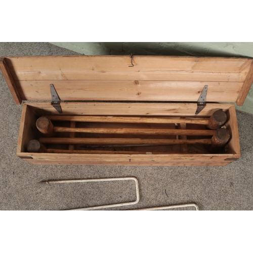 354 - A vintage Croquet set with fitted wooden case.