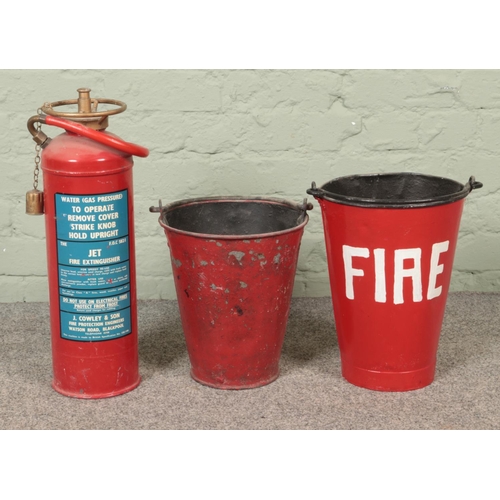 363 - Two red painted buckets along with a J. Cowley and Son water jet fire extinguisher.