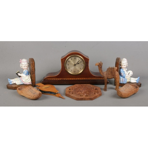 63 - A quantity of woodenwares, including manual wind mahogany mantle clock with banded inlay, wooden clo... 