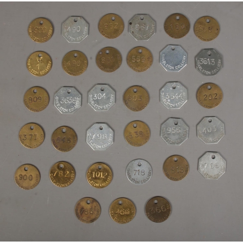 408 - A good collection of Coal miners tallies/pit checks all marked for Sharlston Colliery.