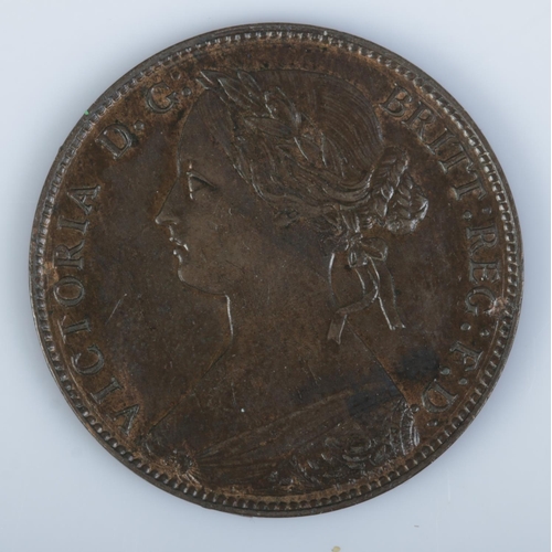 414 - An 1860 Victorian uncirculated bronze penny. Featuring young laureate bust to obverse and toothed bo... 