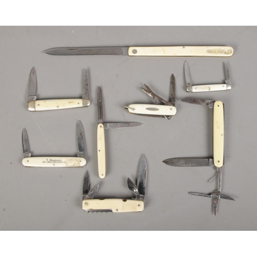 73 - Eight pocket knives with ivorine handles. Includes Encore, George Wostenholm, etc. CANNOT POST OVERS... 