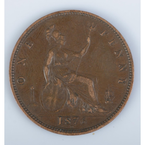 415 - An 1876 Victorian penny, H in exergue. Featuring young bun head bust to obverse.