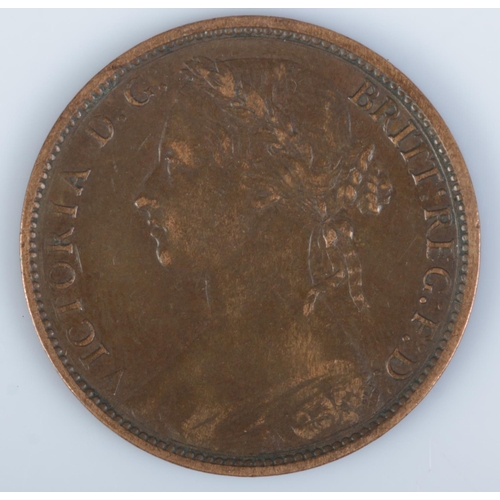 415 - An 1876 Victorian penny, H in exergue. Featuring young bun head bust to obverse.