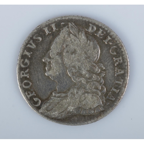 427 - A George II silver sixpence dated 1757.