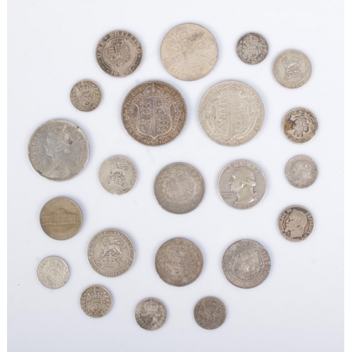 432 - A good collection of silver world coins and tokens to include US quarter dollar, Victorian Rupee, 18... 