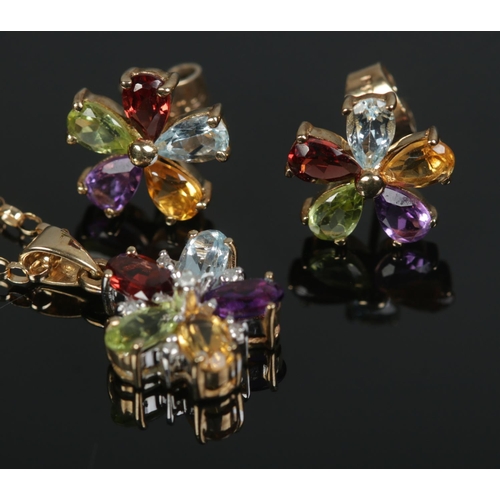 442 - A 9ct gold multi-gem demi parure jewellery suite formed as flowers. Total weight 4.2g.