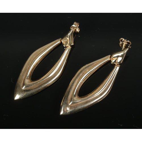 448 - A pair of 9ct gold lozenge shaped drop earrings. Total weight 2g.