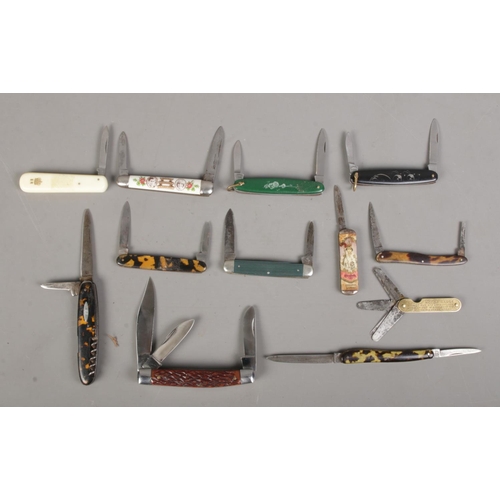 77 - Twelve pocket knives. Includes commemorative, motor gauge, Solar, Wingfield, etc. CANNOT POST OVERSE... 