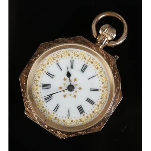 467 - A ladies 14ct gold continental fob watch featuring gilt decorated roman numeral face. 22.42g.