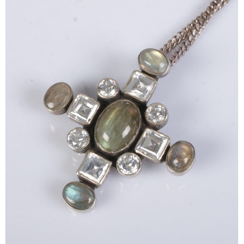 472 - A silver cruciform pendant set with labradorite stones one silver chain. Total weight 22.2g.