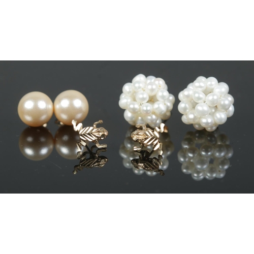 487 - Three pairs of gold earrings to include 9ct gold frog studs (0.78g) and two 14ct gold backed simulat... 