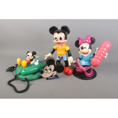 84 - A Mybelle 105 Mickey Mouse telephone together with Minnie mouse example, rubber Mickey Mouse doll an... 