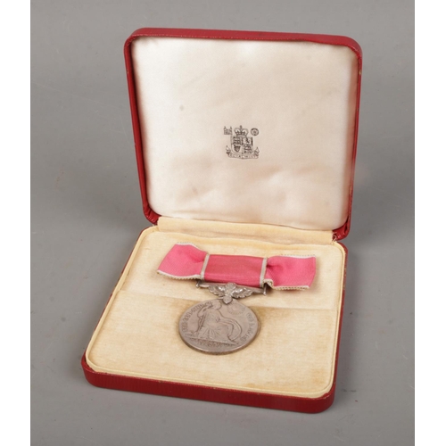 494 - A Queen Elizabeth II British Empire Medal with ladies ribbon bow, displayed in case of issue. Issued... 