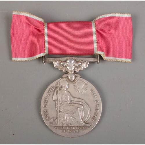 494 - A Queen Elizabeth II British Empire Medal with ladies ribbon bow, displayed in case of issue. Issued... 