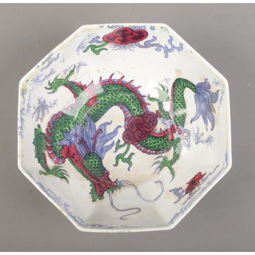 86 - Two pieces of Bursley Ware ceramics in the 'Dragon' design, with yellow lustre glaze, dragon motif a... 