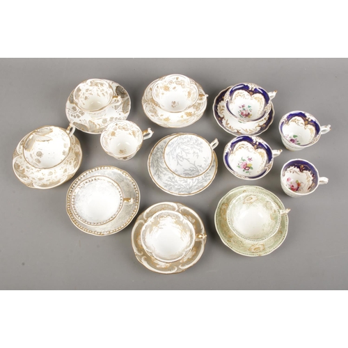 505 - A collection of 19th century Rockingham porcelain teawares. All bearing puce griffin mark.