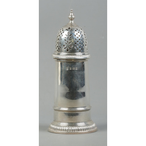 507 - A George V sugar shaker, with finial top. Assayed for Birmingham, 1934, by Barker Brothers Silver Lt... 