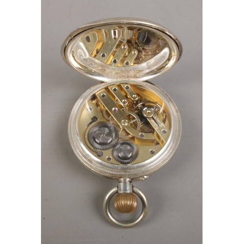 510 - A white metal cased goliath open face pocket watch in a silver mounted watch case with easel back. T... 