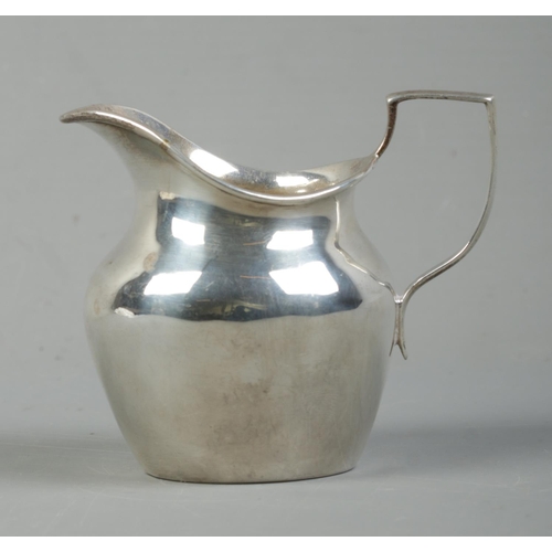 517 - A Victorian silver cream jug. Assayed for London, 1897. Total weight: 74g.