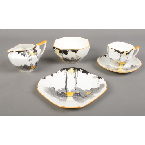 527 - A Shelley Queen Anne Sunset pattern part tea set including cup & saucer, side plate, bowl and jug.