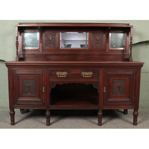 540 - Early 20th century mirror back oak sideboard with central drawers above dog kennel storage area and ... 