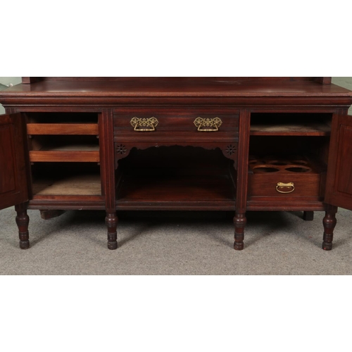 540 - Early 20th century mirror back oak sideboard with central drawers above dog kennel storage area and ... 