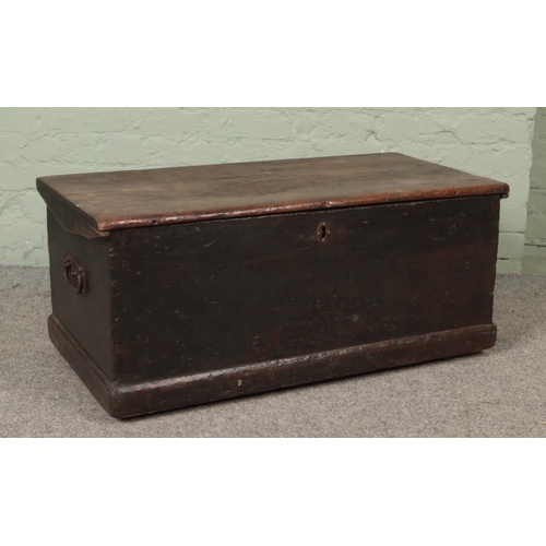 544 - A 19th century stained pine blanket box with interior wooden plaque inscribed 