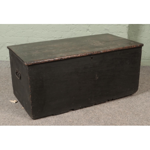 545 - A 19th century pine blanket box with cast iron handles in interior candle box.

Hx46cm
Wx101cm
Dx54c... 