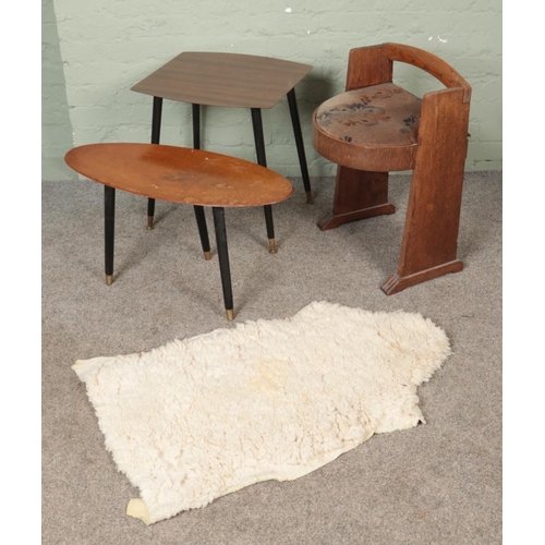 590 - A small quantity of furniture. Includes Art Deco chair, two side tables and a sheep skin rug.