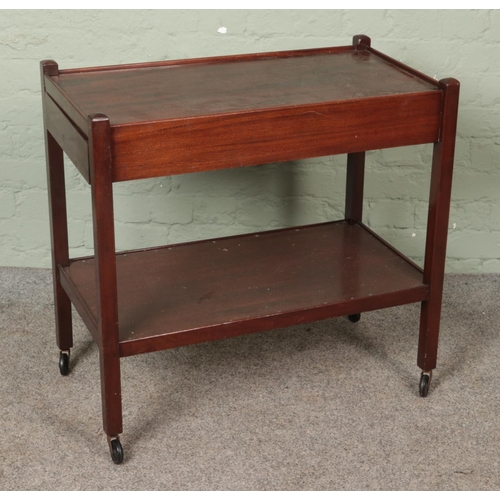 593 - A mahogany tea trolley with drawer to either side.

Hx73cm
Wx77cm
Dx42cm