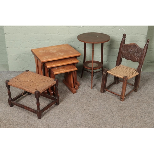 594 - A quantity of small furniture including oak nest of tables, child's chair, occasional table and foot... 