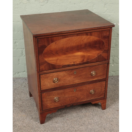 605 - An early 20th century mahogany inlaid commode with hinged top over two faux drawers.

Hx74cm
Wx58cm
... 