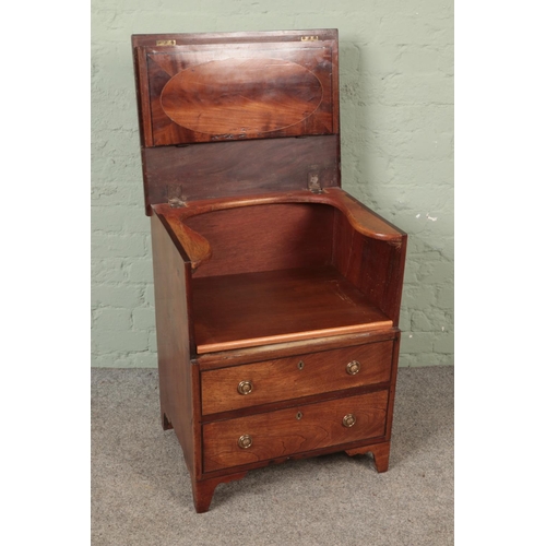 605 - An early 20th century mahogany inlaid commode with hinged top over two faux drawers.

Hx74cm
Wx58cm
... 