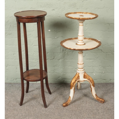 615 - Two two-tier plant stands to include white and gilt painted example.