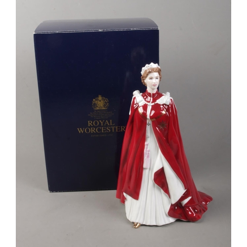 121 - A boxed Royal Worcester figure of Queen Elizabeth II titled In Celebration of the Queen's 80th Birth... 