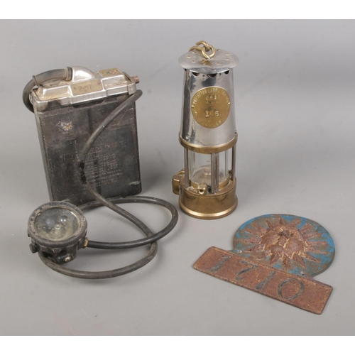 137 - A Protector Lamp and Lighting Co. Type GR6S miners lamp along with BC CAP Lamp Type 1 helmet lamp. A... 