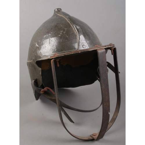 140 - A reproduction Zischagge 'Lobster Tailed' pot helmet.