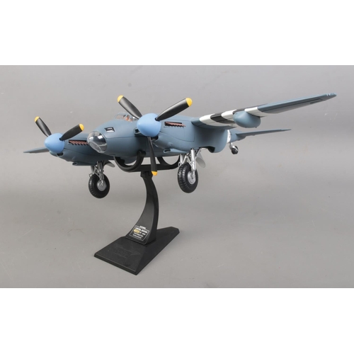 22 - A Limited Edition Corgi Aviation Archive 1/32 scale DeHavilland Mosquito PRXVI (AA34602), on display... 