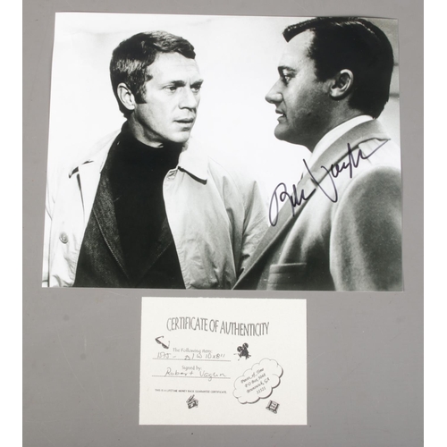 158 - An autographed 'Man From Uncle' lobby card signed by Robert Vaughn. With COA.