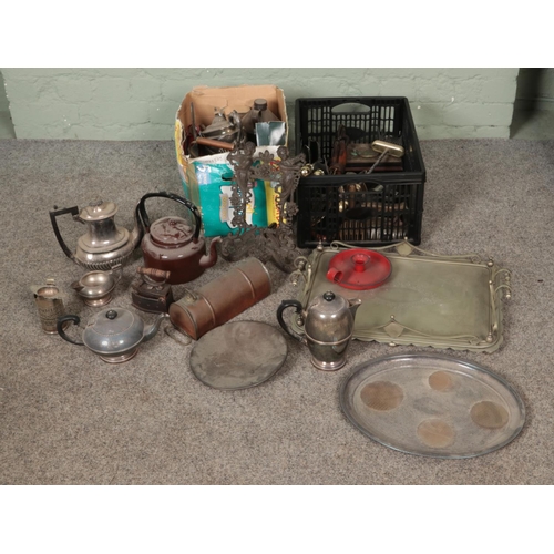 177 - Two boxes of assorted metal wares to include silver plate tea service, companion set, enamel candles... 