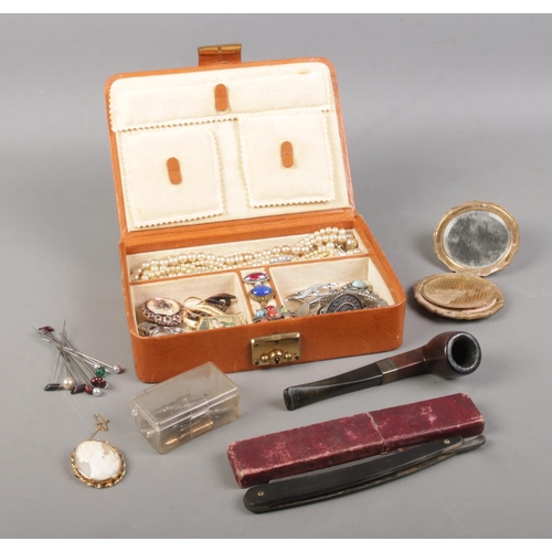 74 - An assortment of collectables, to include Slater Bros razor, pipe, yellow metal cameo brooch and a c... 