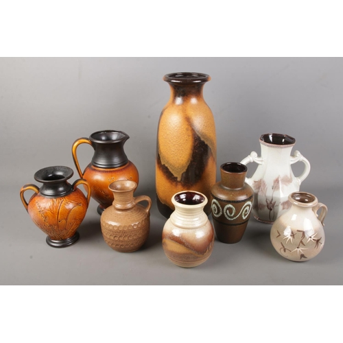 78 - A large selection of West German Pottery including large floor vase and Scheurich examples. 8 vases ... 