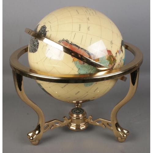 87 - A large modern gemstone globe with countries being composed of minerals and semi-precious stones. Wi... 