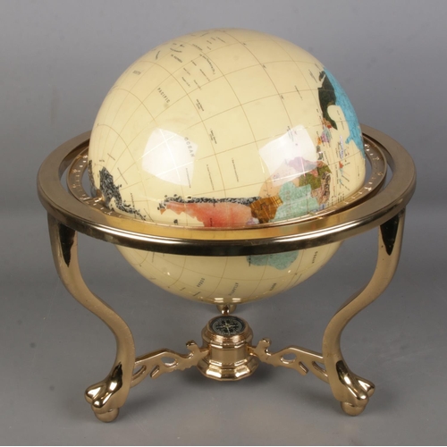 87 - A large modern gemstone globe with countries being composed of minerals and semi-precious stones. Wi... 