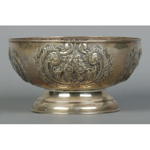 108 - A Victorian silver pedestal bowl with repousse decoration. Assayed Birmingham 1900 by John Hines. He... 