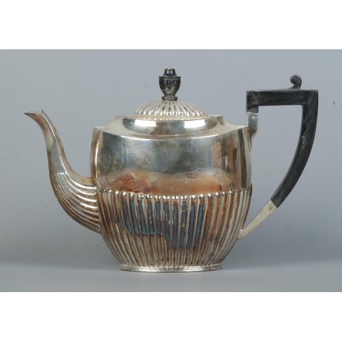 109 - An Edward VIII silver tea pot with ebonsided handle and finial. Assayed Sheffield 1936 by Atkin Brot... 