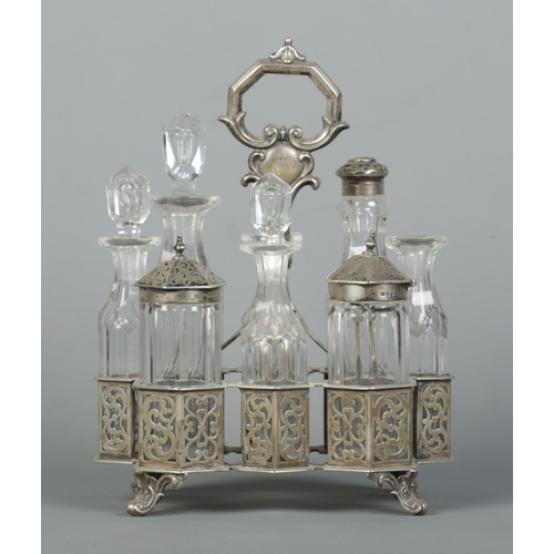 115 - A Victorian silver and cut glass eight bottle cruet set. Assayed London 1843 by John Angell II & Geo... 