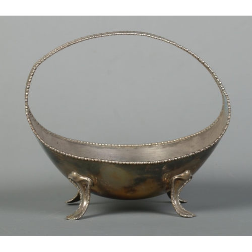 118 - A George V silver basket raised on four scrolled feet. Assayed Sheffield 1912 by Atkin Brothers. Hei... 