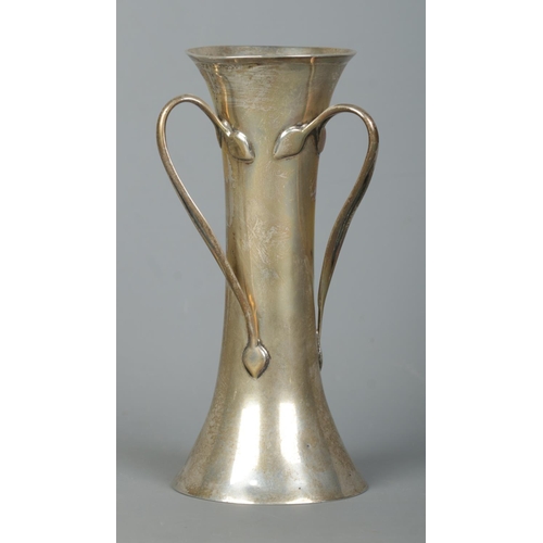 119 - An Art Nouveau silver vase. Having three bifuracted twisting handles. Assayed London 1901 by Charles... 